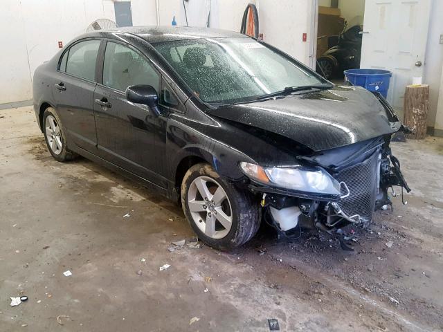 19XFA1E65BE028168 - 2011 HONDA CIVIC LX-S Schwarz Foto 1