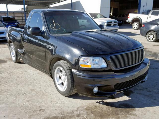 2FTZF0730XCA84362 - 1999 FORD F150 SVT L BLACK photo 1