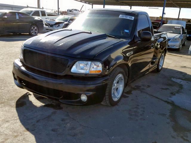 2FTZF0730XCA84362 - 1999 FORD F150 SVT L BLACK photo 2