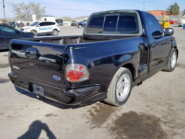 2FTZF0730XCA84362 - 1999 FORD F150 SVT L BLACK photo 4