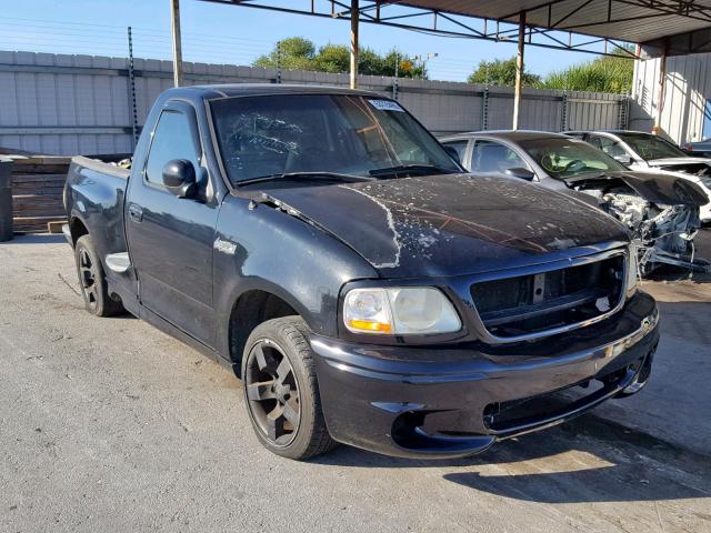 2FTRF07314CA74189 - 2004 FORD F150 SVT L BLACK photo 1