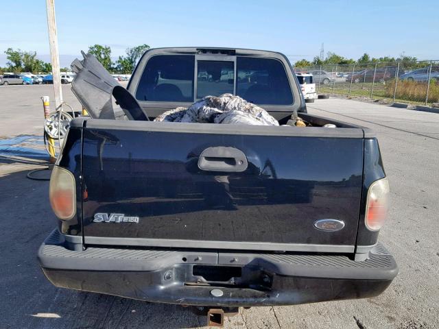 2FTRF07314CA74189 - 2004 FORD F150 SVT L BLACK photo 6