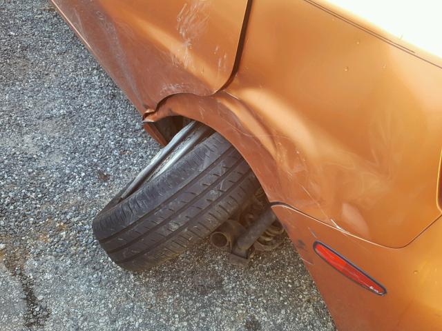 KL1TD62605B316409 - 2005 CHEVROLET AVEO BASE ORANGE photo 9