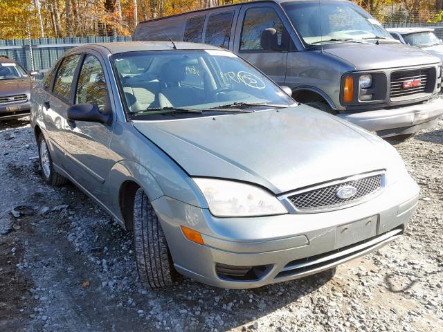 1FAFP34N95W255480 - 2005 FORD FOCUS ZX4 GREEN photo 1