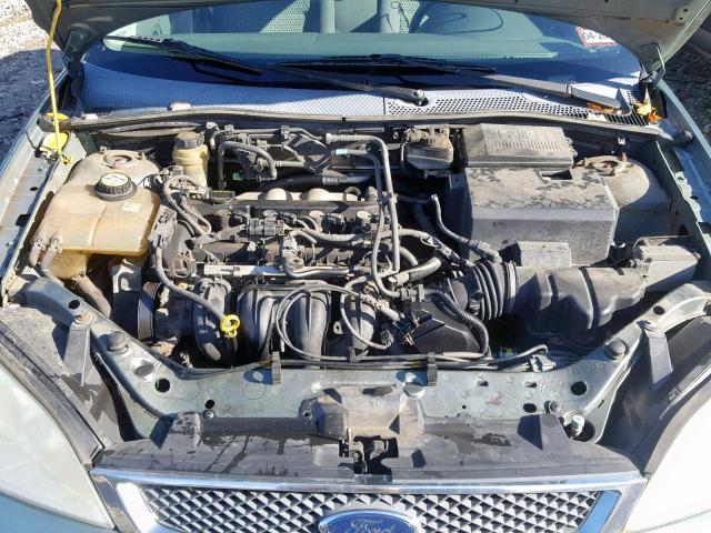 1FAFP34N95W255480 - 2005 FORD FOCUS ZX4 GREEN photo 7