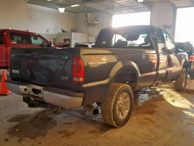 1FTWX31P95EB56261 - 2005 FORD F350 SRW S BLACK photo 4