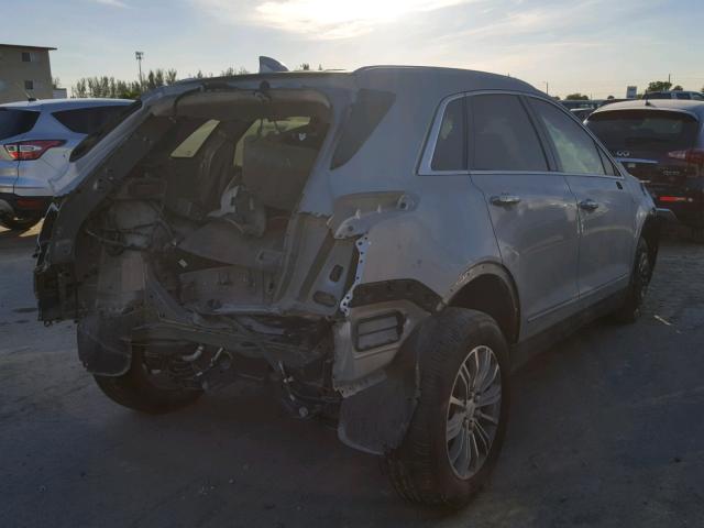 1GYKNBRS1HZ124032 - 2017 CADILLAC XT5 LUXURY SILVER photo 4