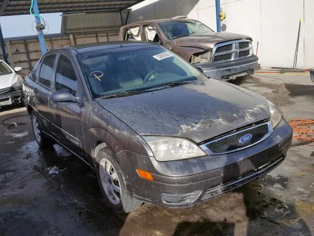 1FAFP34N45W223584 - 2005 FORD FOCUS ZX4 GRAY photo 1