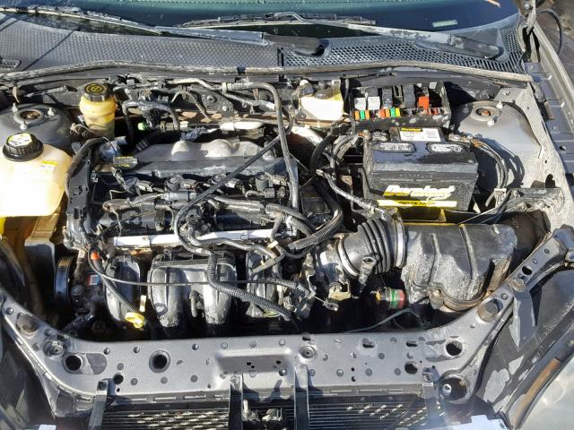 1FAFP34N45W223584 - 2005 FORD FOCUS ZX4 GRAY photo 7