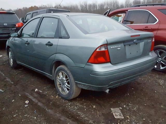 1FAHP34N35W283235 - 2005 FORD FOCUS ZX4 GRAY photo 3