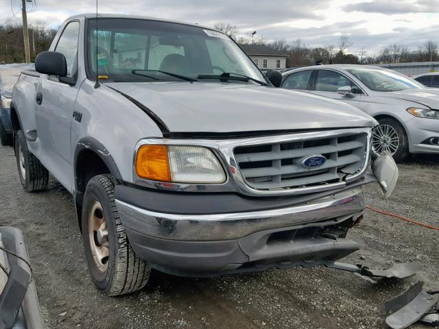 2FTRF08234CA34377 - 2004 FORD F-150 HERI SILVER photo 1