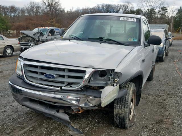 2FTRF08234CA34377 - 2004 FORD F-150 HERI SILVER photo 2