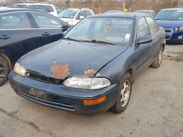 1Y1SK5268VZ414577 - 1997 GEO PRIZM BASE GREEN photo 2