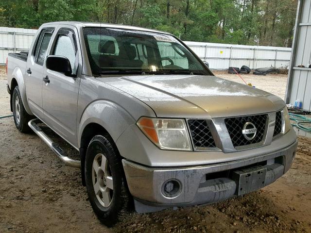 1N6AD07U06C453086 - 2006 NISSAN FRONTIER C SILVER photo 1