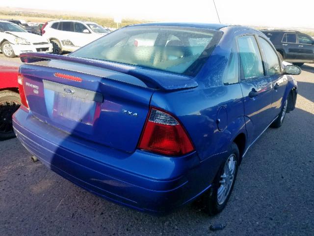 1FAFP34N45W188710 - 2005 FORD FOCUS ZX4 BLUE photo 4