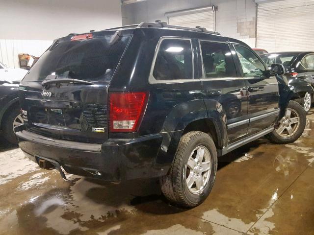 1J8HR48P97C506073 - 2007 JEEP GRAND CHER BLACK photo 4