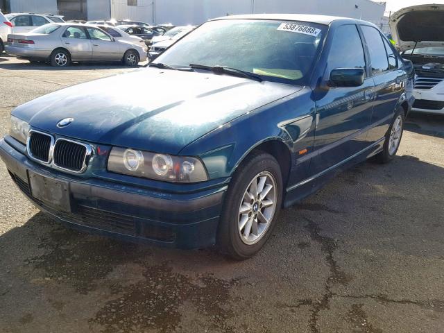 WBACC9324WEE59727 - 1998 BMW 318 I GREEN photo 2