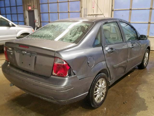 1FAFP34N77W289811 - 2007 FORD FOCUS ZX4 GRAY photo 4