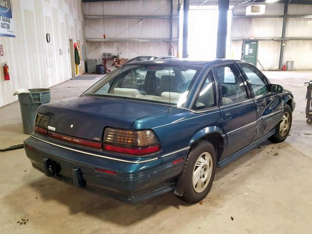 1G2WJ52M8SF220740 - 1995 PONTIAC GRAND PRIX TEAL photo 4