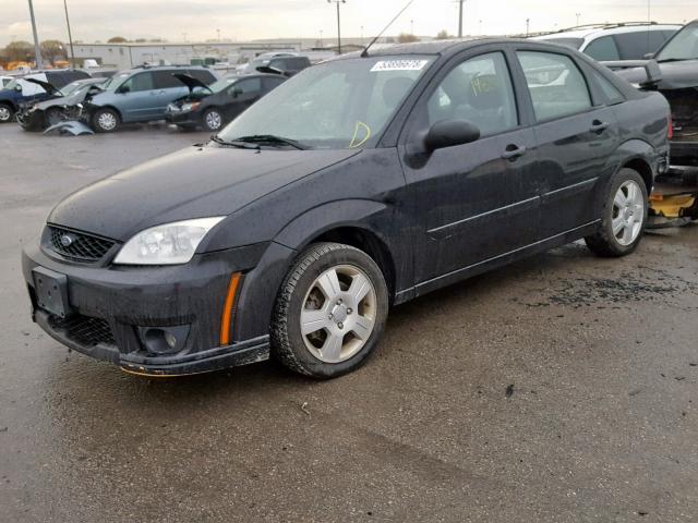 1FAHP34NX7W201424 - 2007 FORD FOCUS ZX4 BLACK photo 2