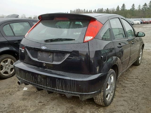 1FAHP37N07W295986 - 2007 FORD FOCUS ZX5 BLACK photo 4