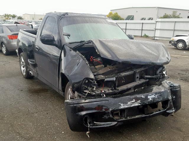 2FTRF07374CA59468 - 2004 FORD F150 SVT L BLACK photo 1