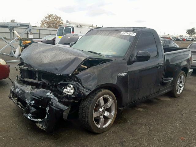 2FTRF07374CA59468 - 2004 FORD F150 SVT L BLACK photo 2