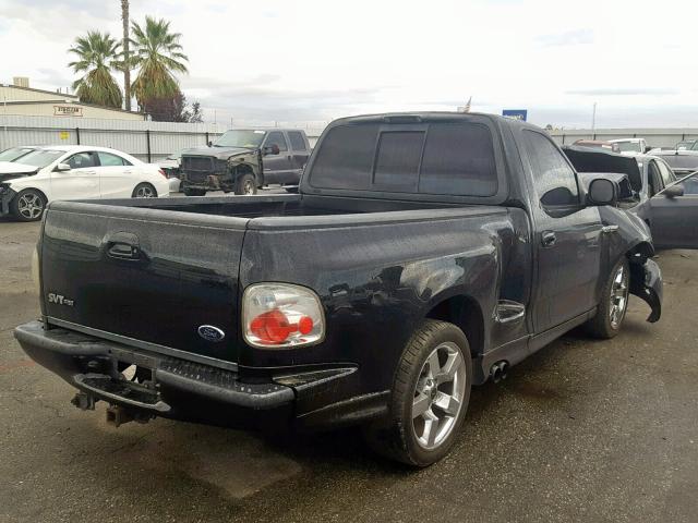 2FTRF07374CA59468 - 2004 FORD F150 SVT L BLACK photo 4