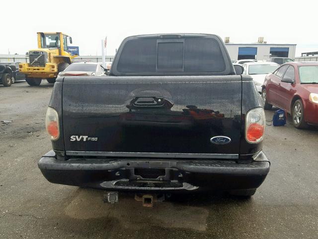 2FTRF07374CA59468 - 2004 FORD F150 SVT L BLACK photo 6