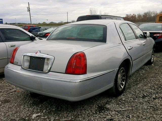 1LNHM82W6YY827677 - 2000 LINCOLN TOWN CAR S SILVER photo 4