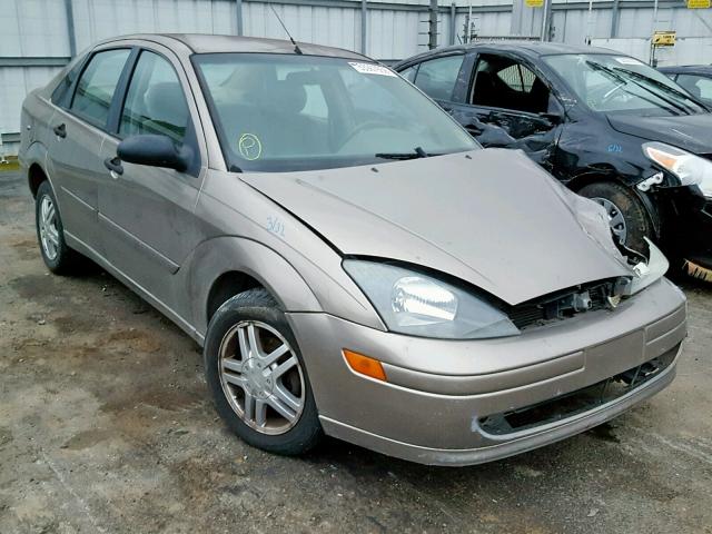 1FAFP34Z74W187827 - 2004 FORD FOCUS SE C TAN photo 1