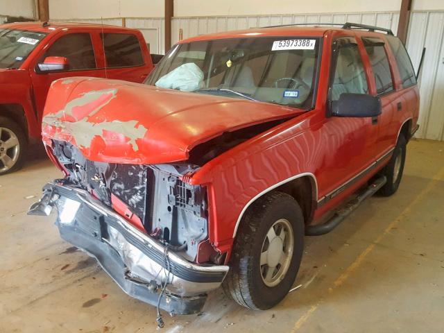 1GKEC13R0XJ724468 - 1999 GMC YUKON RED photo 2