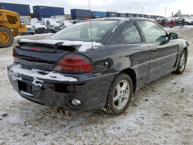 1G2NW12E0XM878019 - 1999 PONTIAC GRAND AM G BLACK photo 4