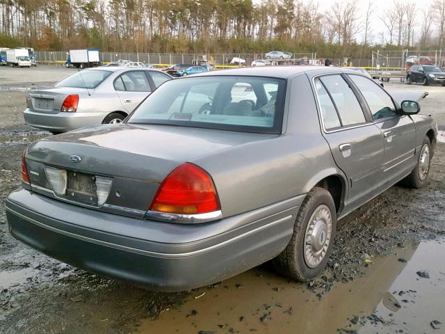 2FAFP73W4WX149624 - 1998 FORD CROWN VICT GRAY photo 4