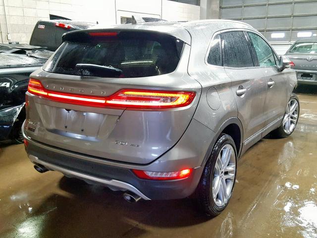 5LMCJ3D99HUL21178 - 2017 LINCOLN MKC RESERV GRAY photo 4