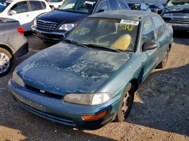 1Y1SK5260TZ023551 - 1996 GEO PRIZM BASE GREEN photo 2