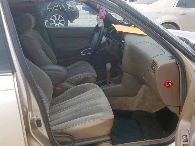 JT2BG12K6T0348133 - 1996 TOYOTA CAMRY DX GOLD photo 5