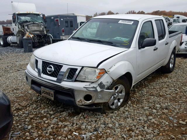 1N6AD07UX9C427924 - 2009 NISSAN FRONTIER C WHITE photo 2