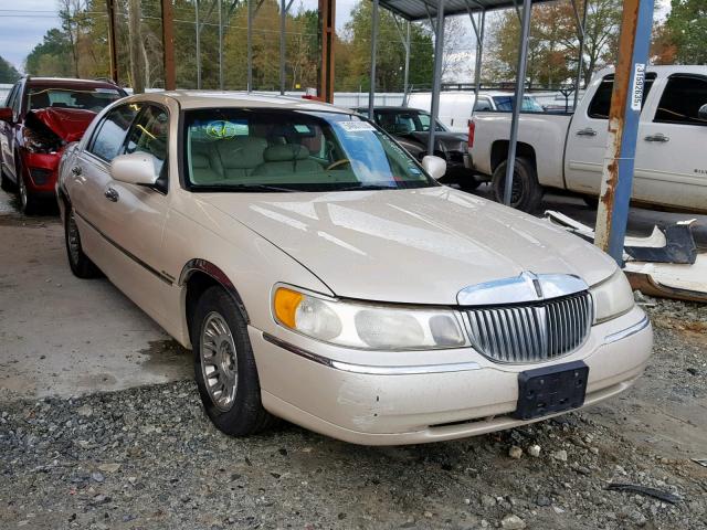 1LNHM83W6YY873802 - 2000 LINCOLN TOWN CAR C BEIGE photo 1