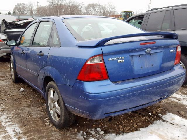 1FAFP34N35W182235 - 2005 FORD FOCUS ZX4 BLUE photo 3