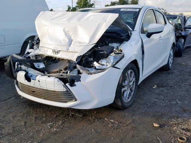 3MYDLBZV3GY115017 - 2016 TOYOTA SCION IA WHITE photo 2