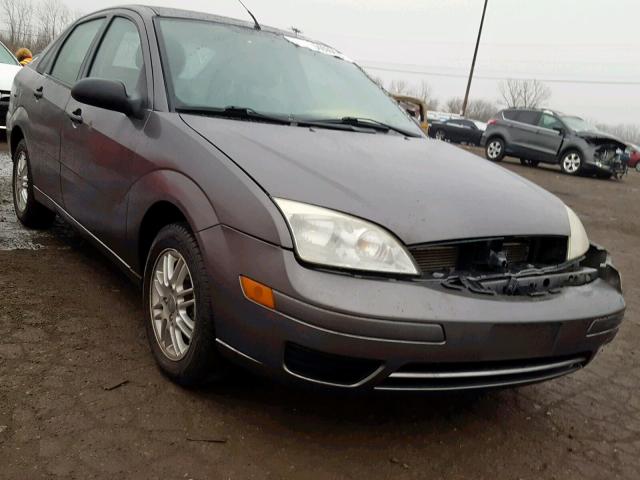 1FAFP34N06W124763 - 2006 FORD FOCUS ZX4 GRAY photo 1