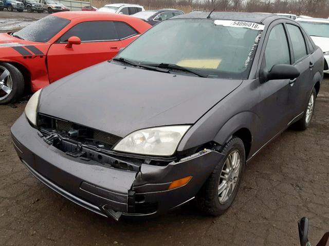 1FAFP34N06W124763 - 2006 FORD FOCUS ZX4 GRAY photo 2