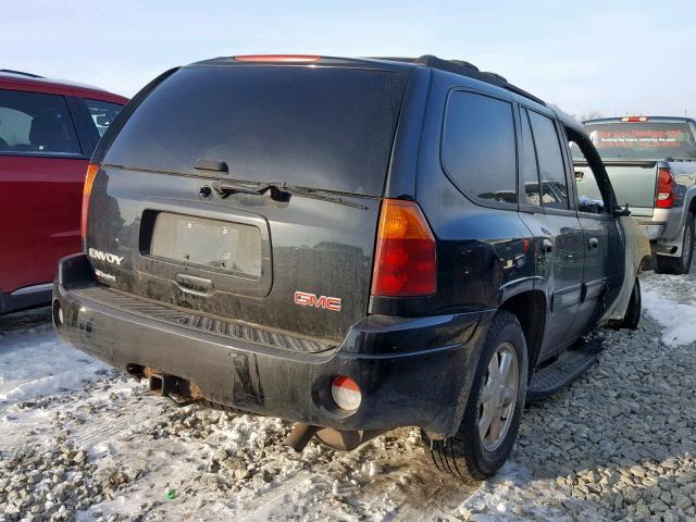 1GKDT13S242152632 - 2004 GMC ENVOY BLACK photo 4