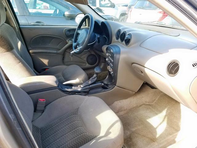 1G2NE52F44M578949 - 2004 PONTIAC GRAND AM S GOLD photo 5