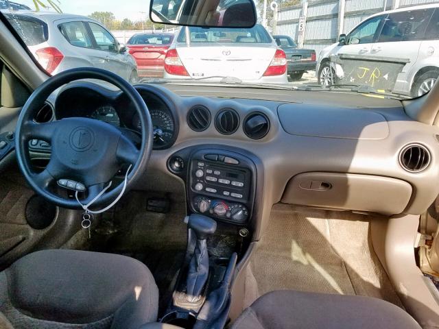 1G2NE52F44M578949 - 2004 PONTIAC GRAND AM S GOLD photo 9