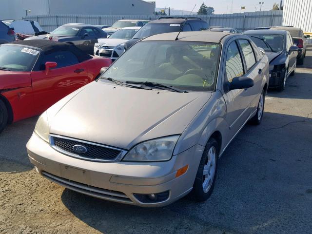 1FAHP34N37W129336 - 2007 FORD FOCUS ZX4 GOLD photo 2