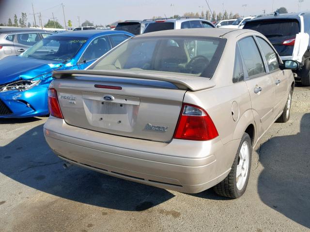 1FAHP34N37W129336 - 2007 FORD FOCUS ZX4 GOLD photo 4