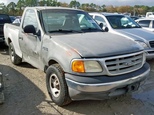 2FTRF17204CA36093 - 2004 FORD F-150 HERI SILVER photo 1