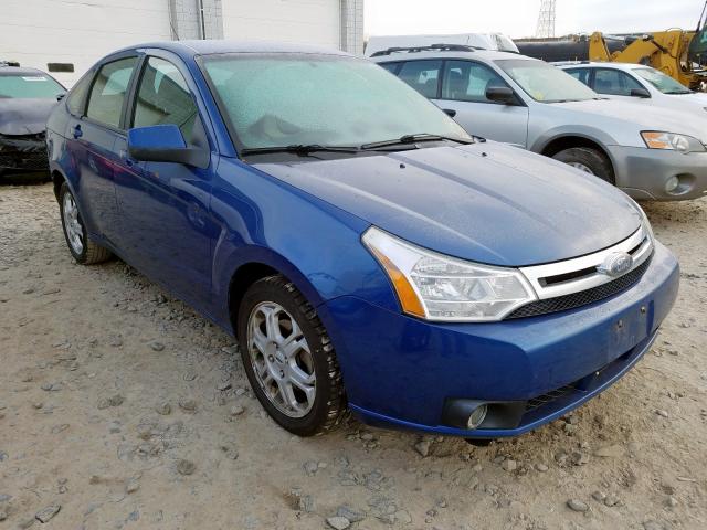 1FAHP36NX9W209216 - 2009 FORD FOCUS SES BLUE photo 1